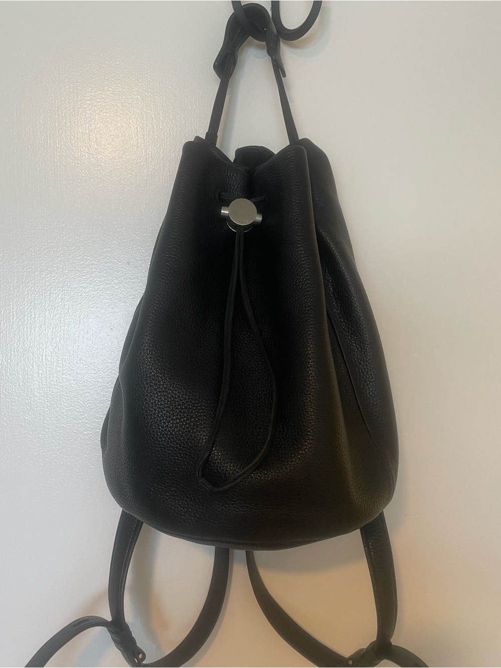 KARA Drawcord backpack in Black Pebbled Leather